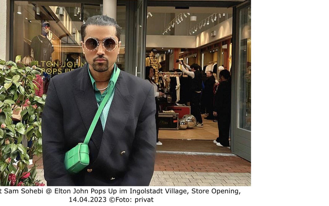 Samuel Sohebi attending the Elton John Pops Up event at Ingolstadt Village, featured by Ganz München as part of its lifestyle an Samuel Sohebi, international red carpet stylist and television personality, attending the Elton John Pops Up event at Ingolstadt Village, featured in the lifestyle and fashion coverage of Ganz München.